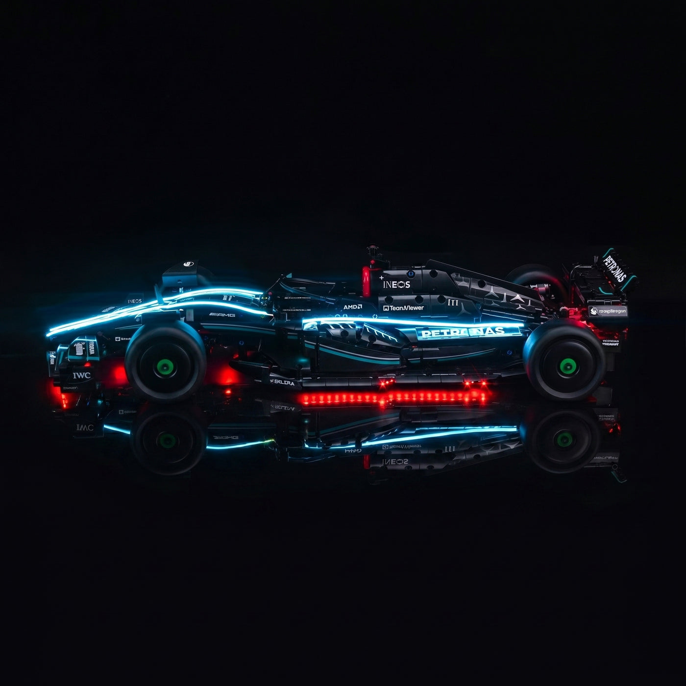LEGO® Technic Mercedes-AMG F1 W14 E Performance #42171 — side angle with lights on (display light kit)