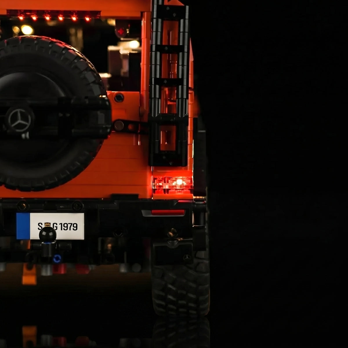 LEGO® Technic Mercedes-Benz G 500 PROFESSIONAL Line #42177 illuminated at night, with the LED lighting kit