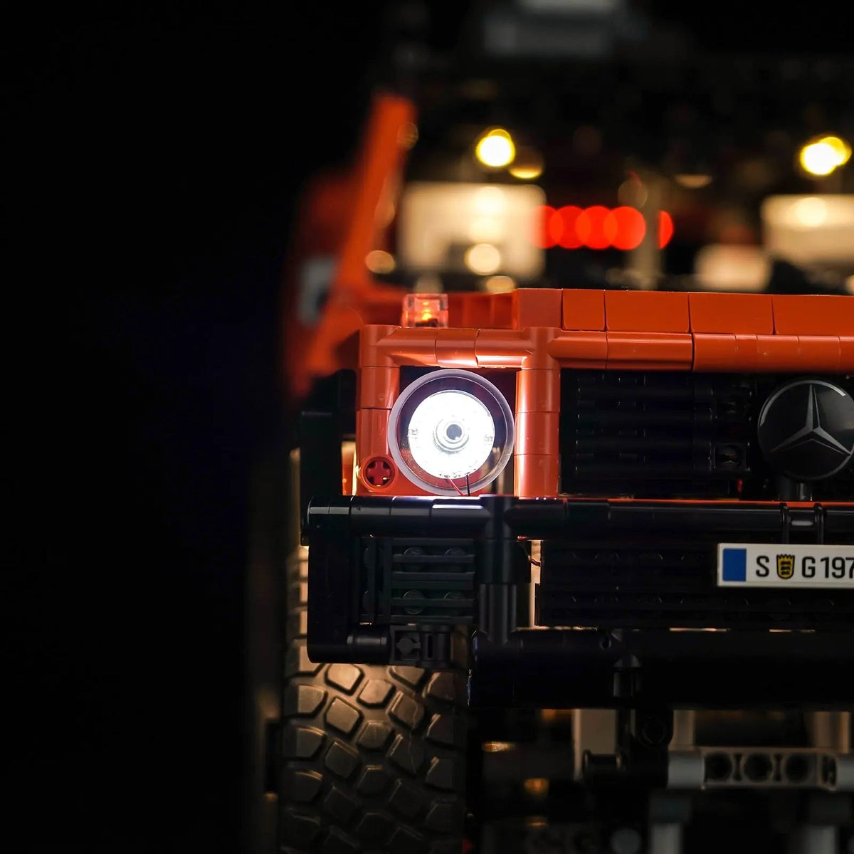 LEGO® Technic Mercedes-Benz G 500 PROFESSIONAL Line #42177 side angle with lights on, with the RGB LED light kit