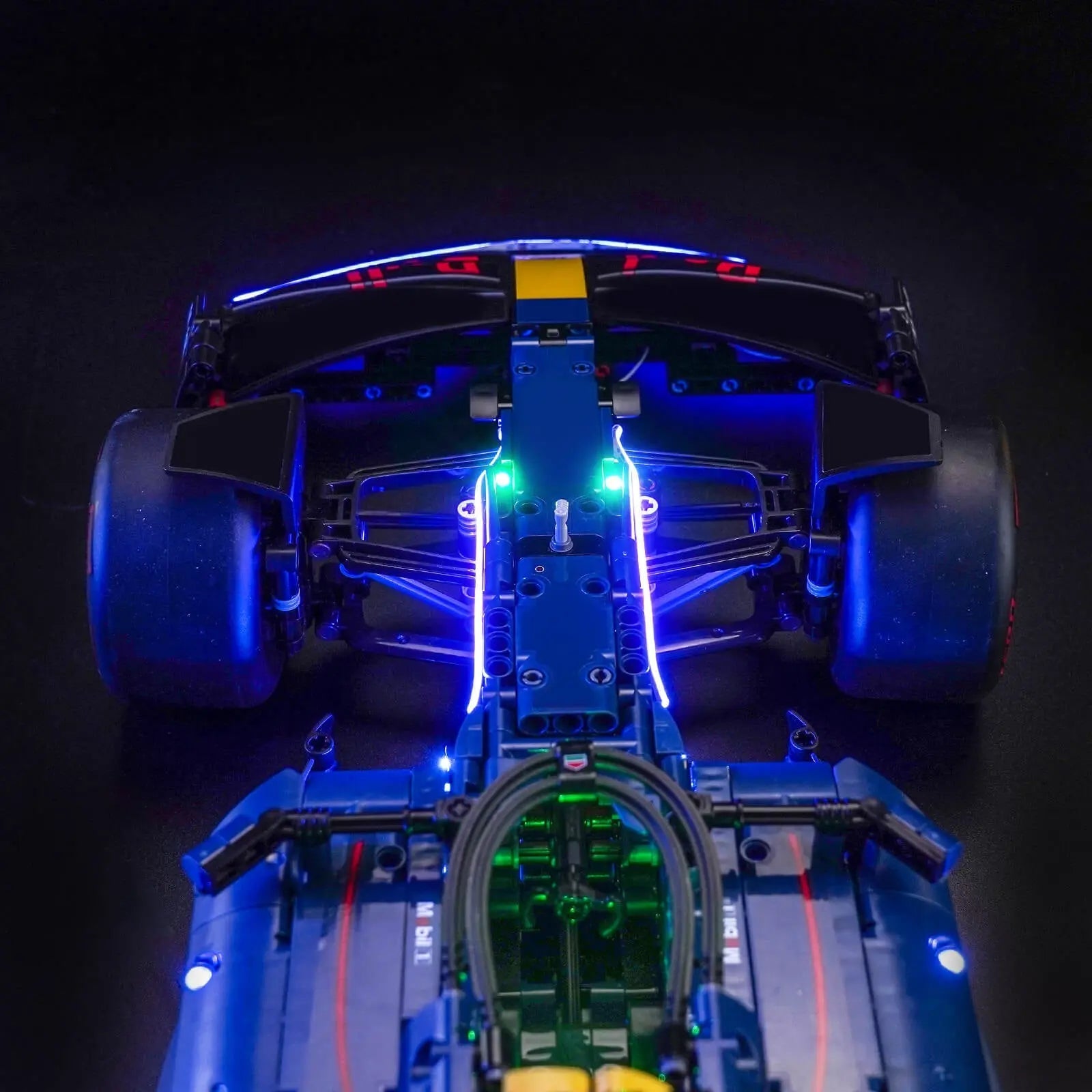 LEGO Technic Oracle Red Bull Racing RB20 F1 Car #42206 illuminated at night