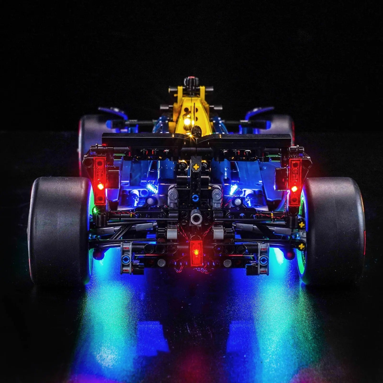 LEGO Technic Oracle Red Bull Racing RB20 F1 Car #42206 illuminated at night