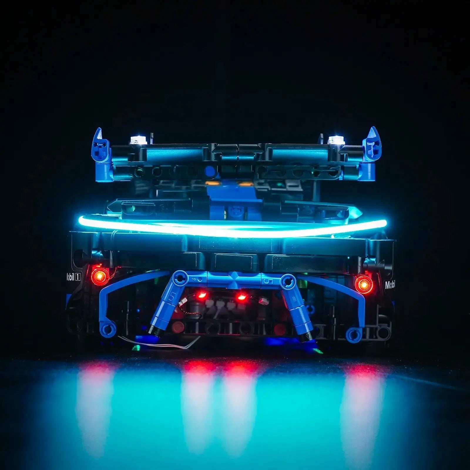 LEGO® Technic Porsche GT4 e-Performance Race Car #42176 front view fully lit, with the DIY LED light kit