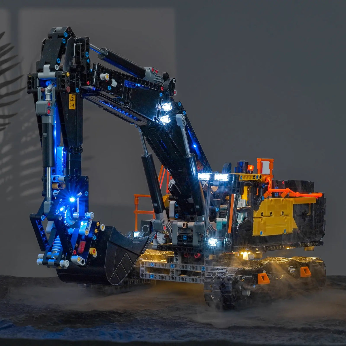 side angle with lights on: Bright My Bricks custom LED lighting for LEGO® Technic Volvo EC500 Hybrid Excavator #42215