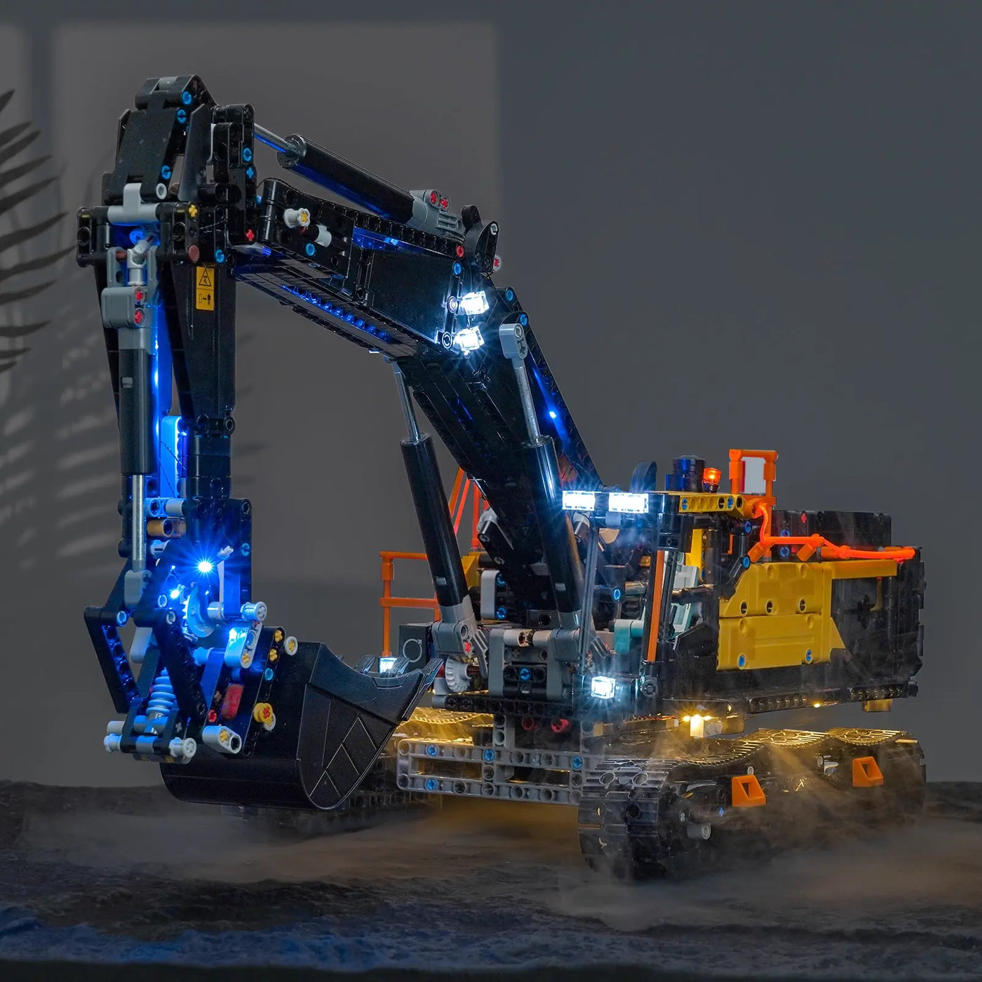 side angle with lights on: Bright My Bricks custom LED lighting for LEGO® Technic Volvo EC500 Hybrid Excavator #42215