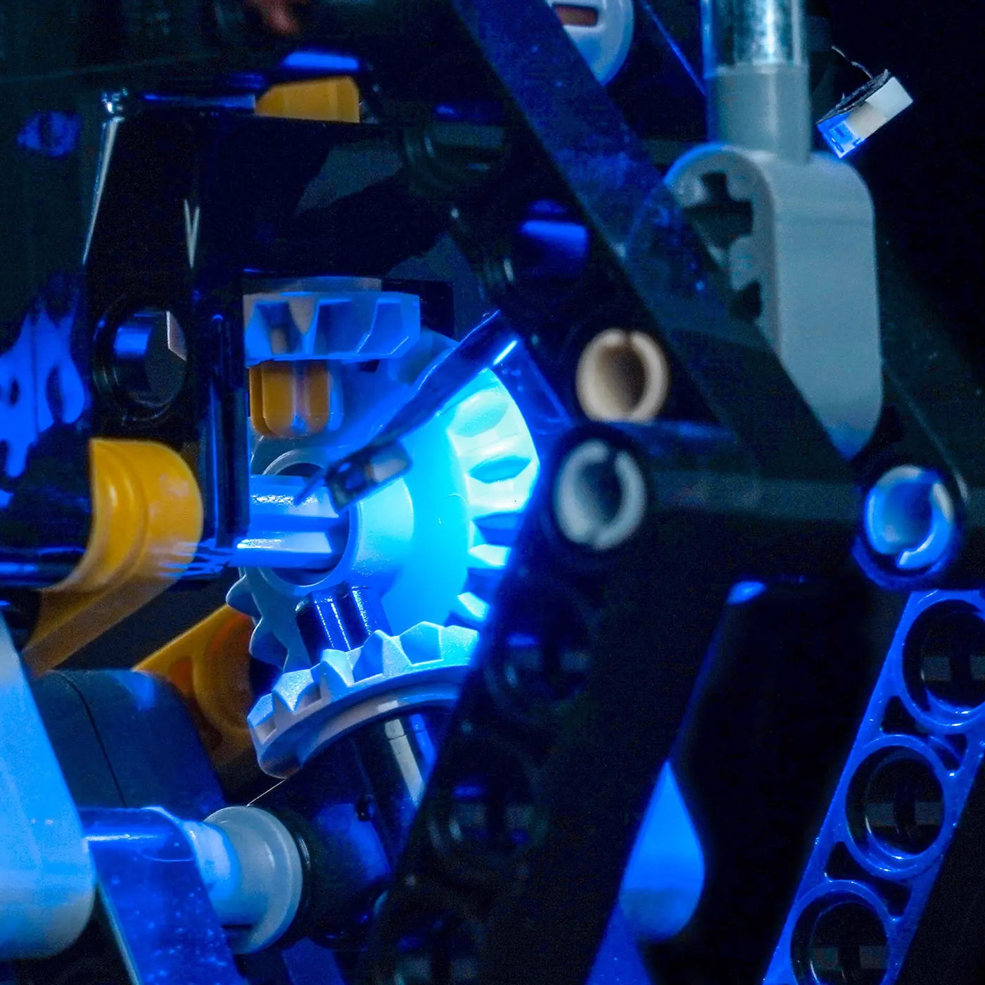 LEGO® Technic Volvo EC500 Hybrid Excavator #42215 warm LED glow detail, with the premium LED light kit