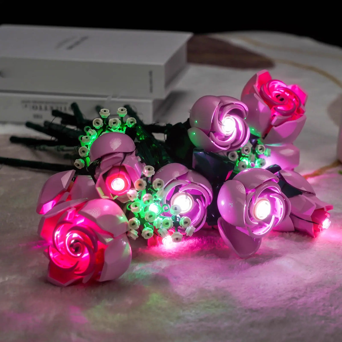 LEGO® The Botanical Collection Bouquet of Pink Roses #10374 side angle with lights on, with the display light kit