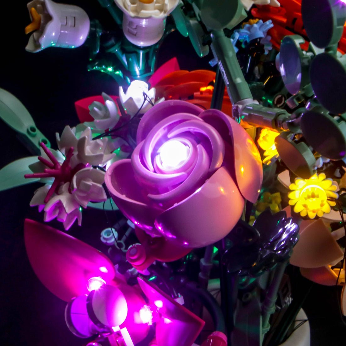 RGB LED light kit for LEGO® The Botanical Collection Pretty Pink Flower Bouquet #10342, fully illuminated on display