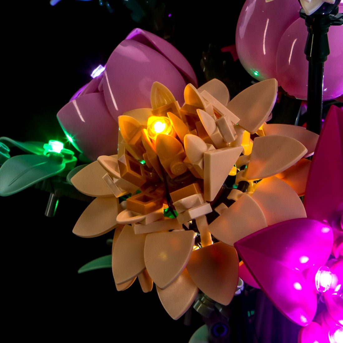 LEGO® The Botanical Collection Pretty Pink Flower Bouquet #10342 installed and glowing, with the LED light kit