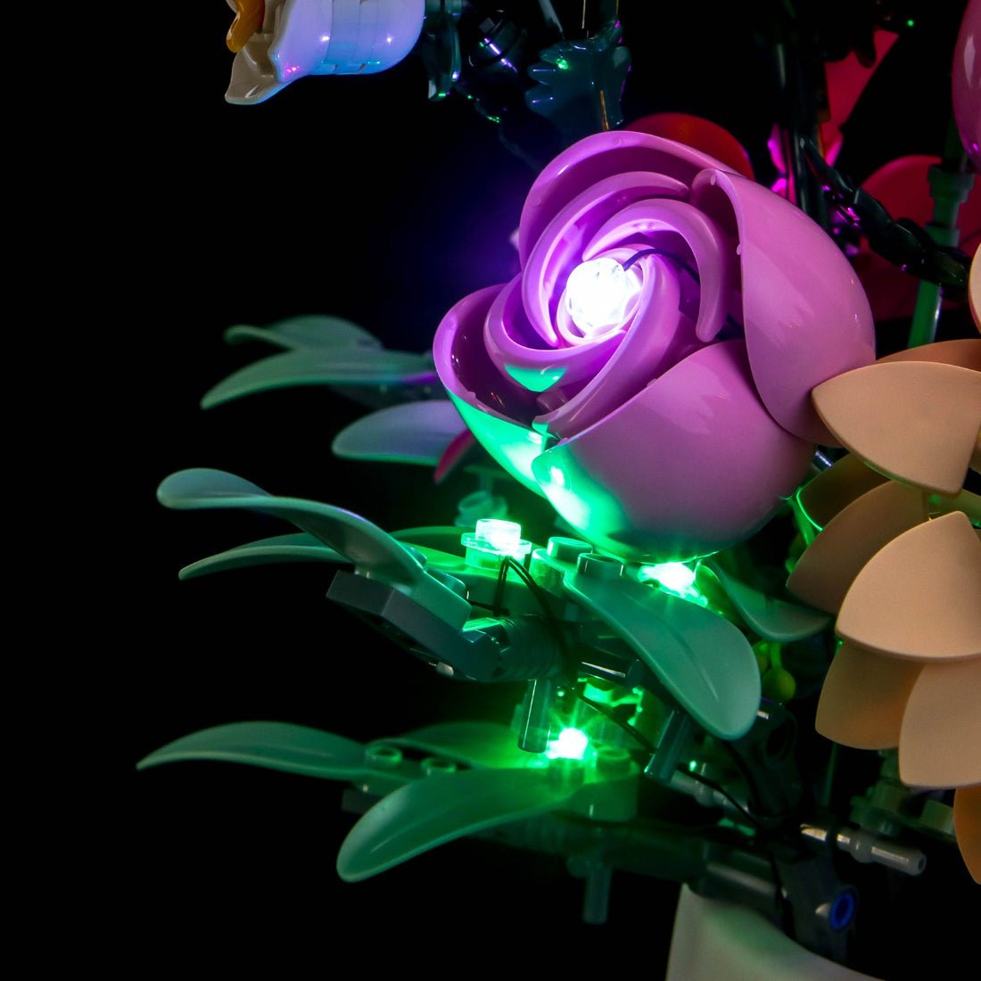 LEGO® The Botanical Collection Pretty Pink Flower Bouquet #10342 — warm LED glow detail (light kit)