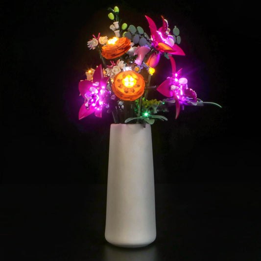 LEGO® The Botanical Collection Pretty Pink Flower Bouquet #10342 installed and glowing, with the display light kit