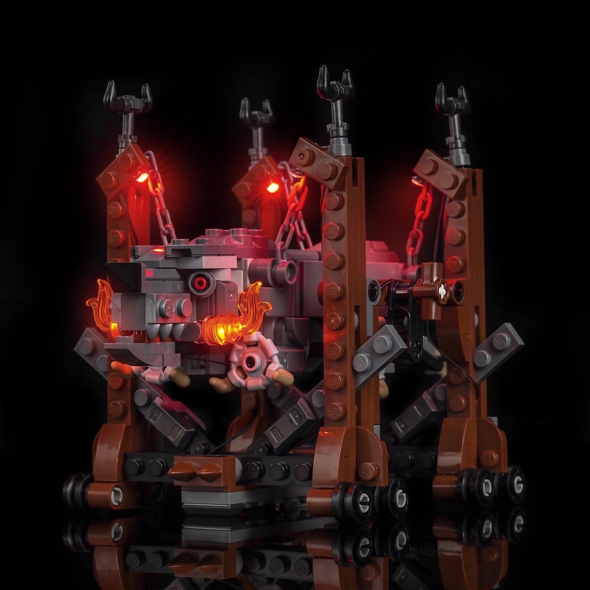 Angled front view showing the illuminated head and the timber support structure — LEGO® Grond #40893, LED light kit