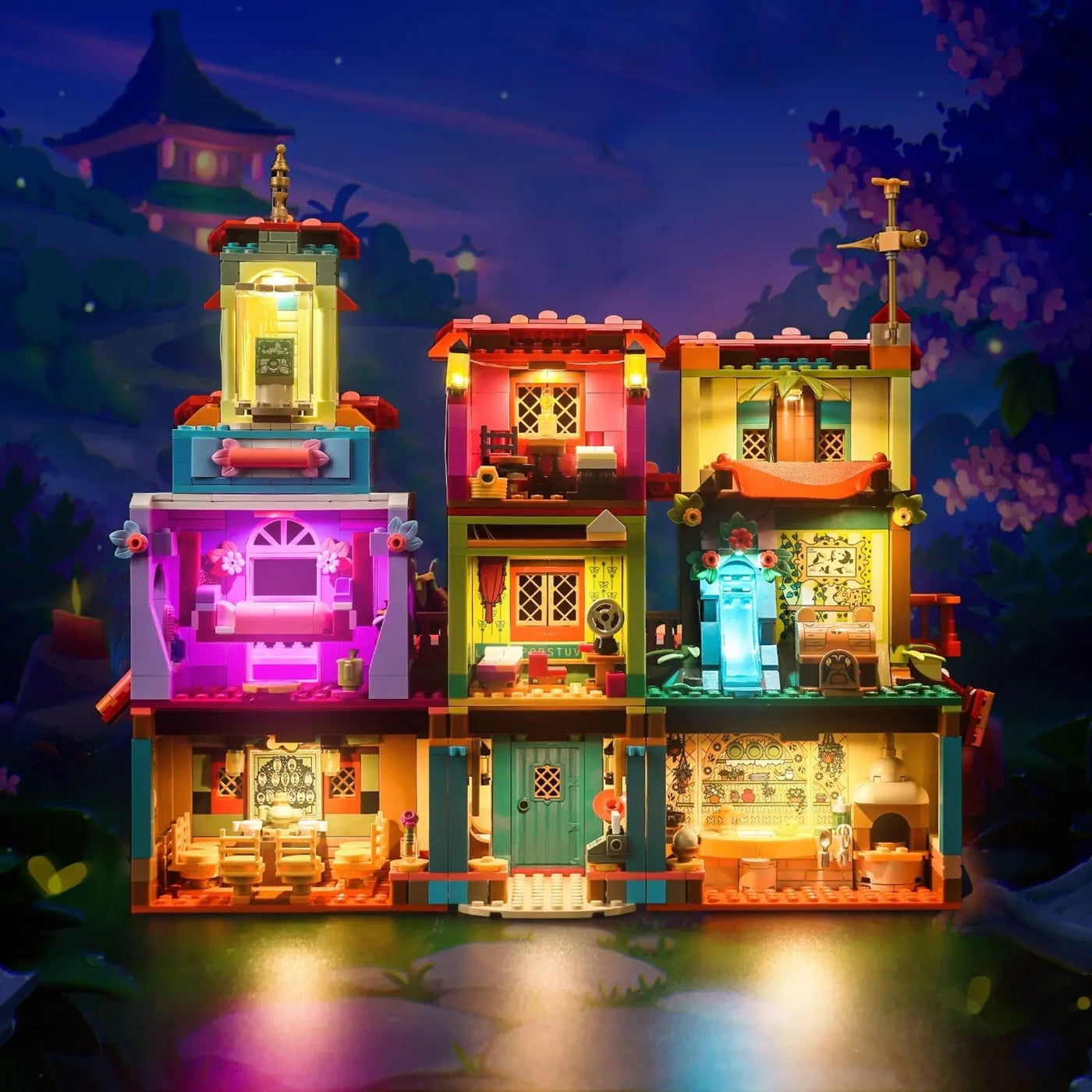 LEGO® The Magical Madrigal House #43245 illuminated at night, with the LED light kit