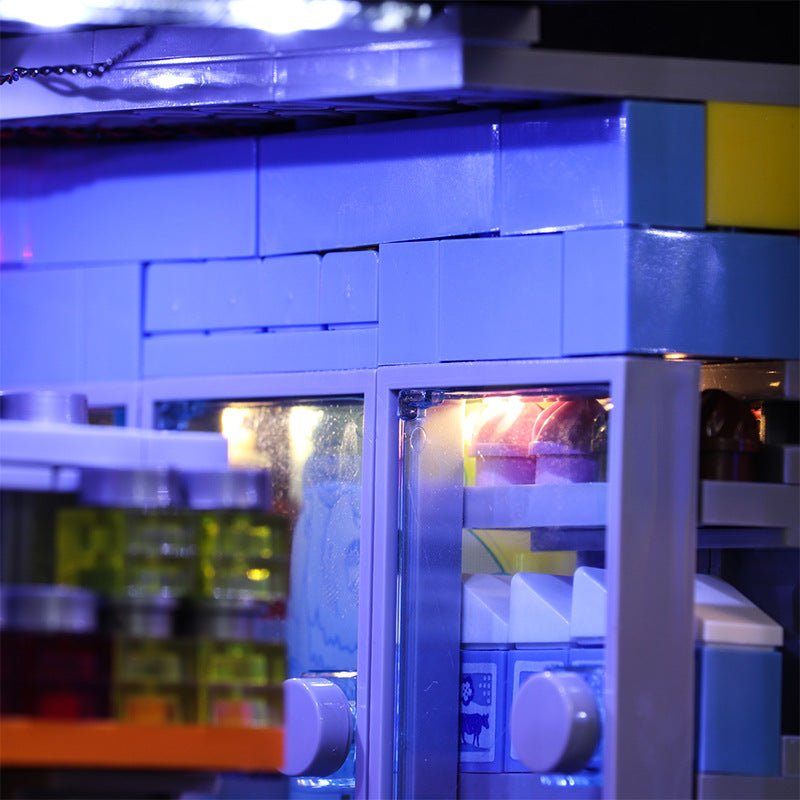 DIY LED light kit for LEGO® The Simpsons The Kwik-E-Mart #71016, fully illuminated on display