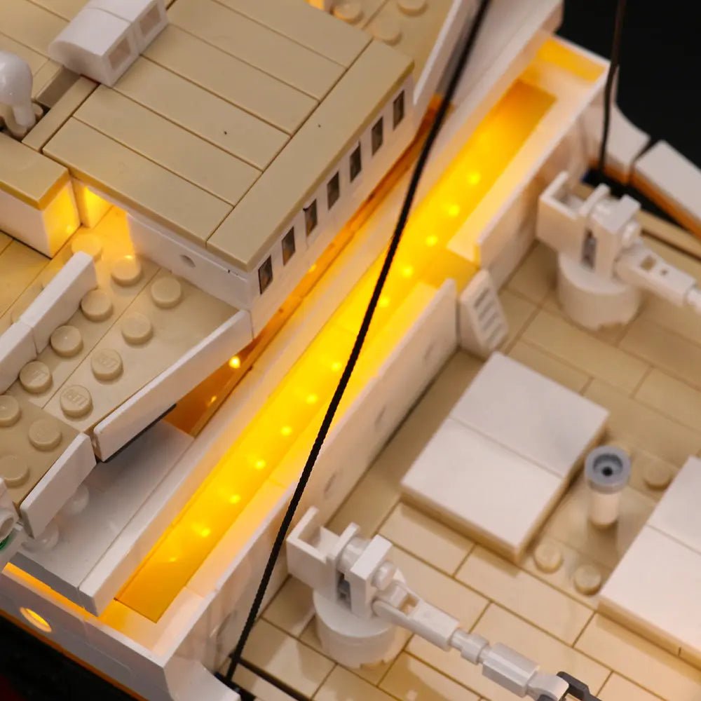 LEGO® Titanic #10294 fully illuminated on display, with the custom LED lighting