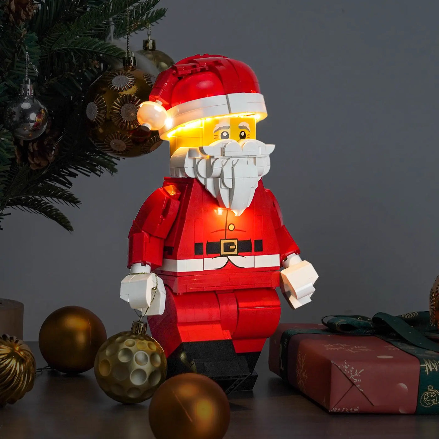 LEGO® Up-Scaled Santa Minifigure #40820 — display lighting in a dark room (light kit)