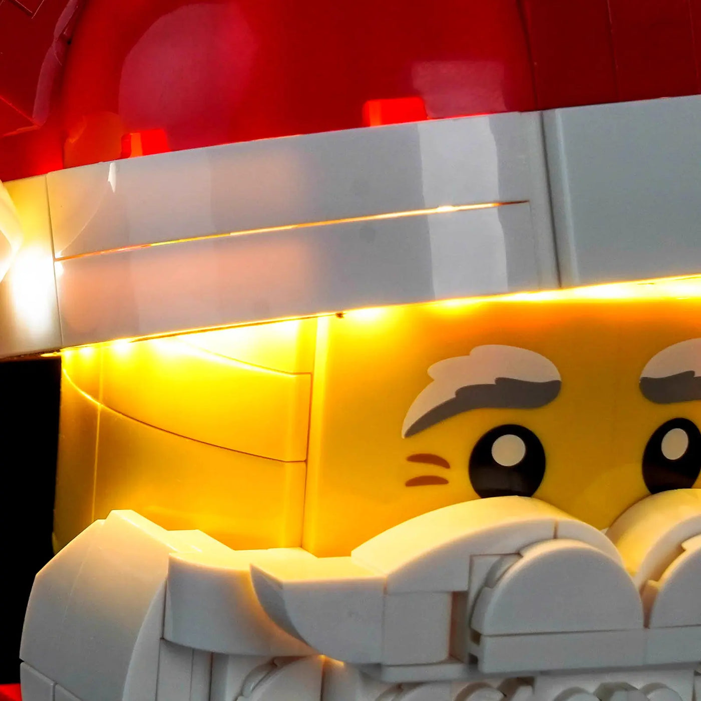 LEGO® Up-Scaled Santa Minifigure #40820 showcase lighting view, with the premium LED light kit
