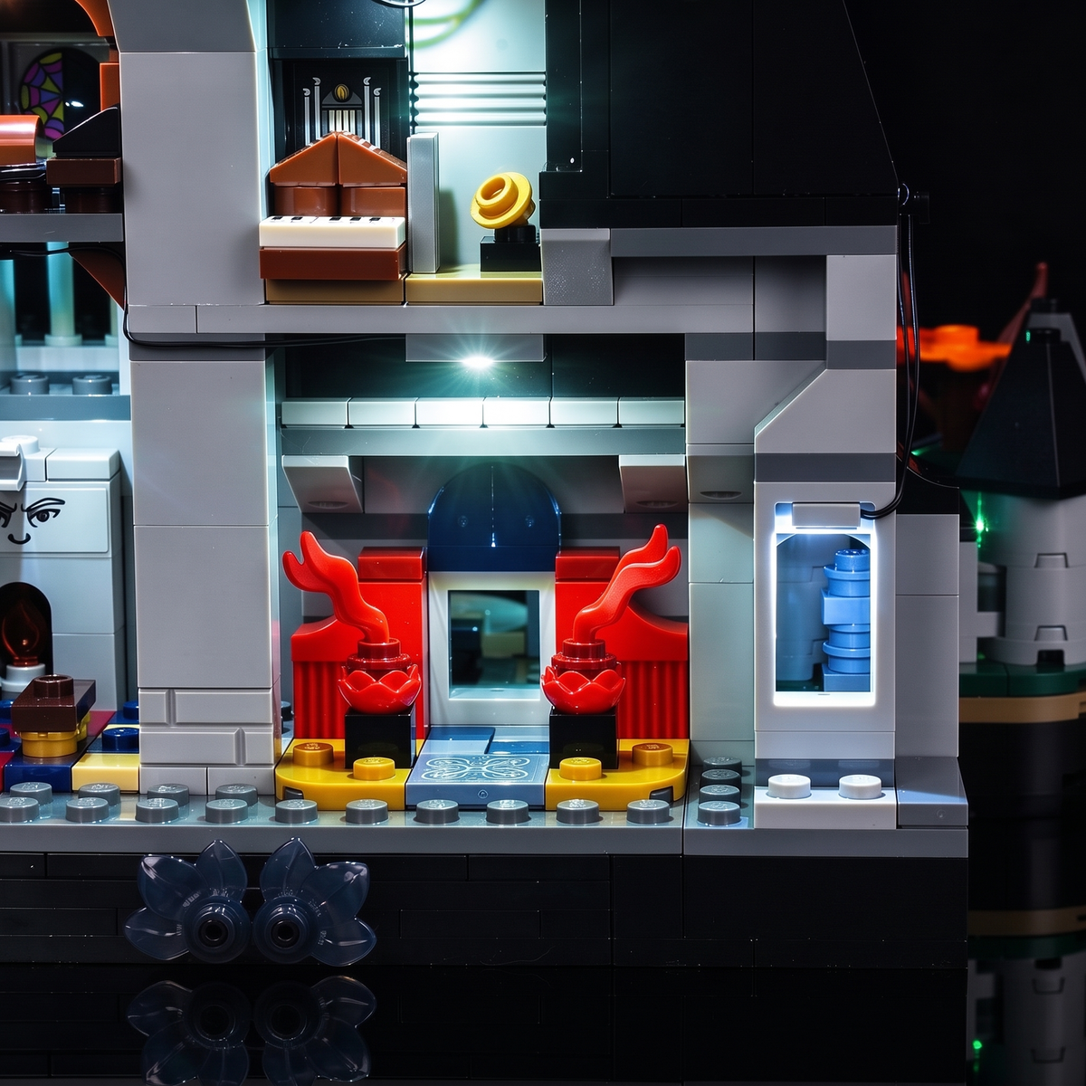 Close-up of white ceiling lights and the interior rooms with red seats — LEGO® Nevermore Academy #76788, LED light kit