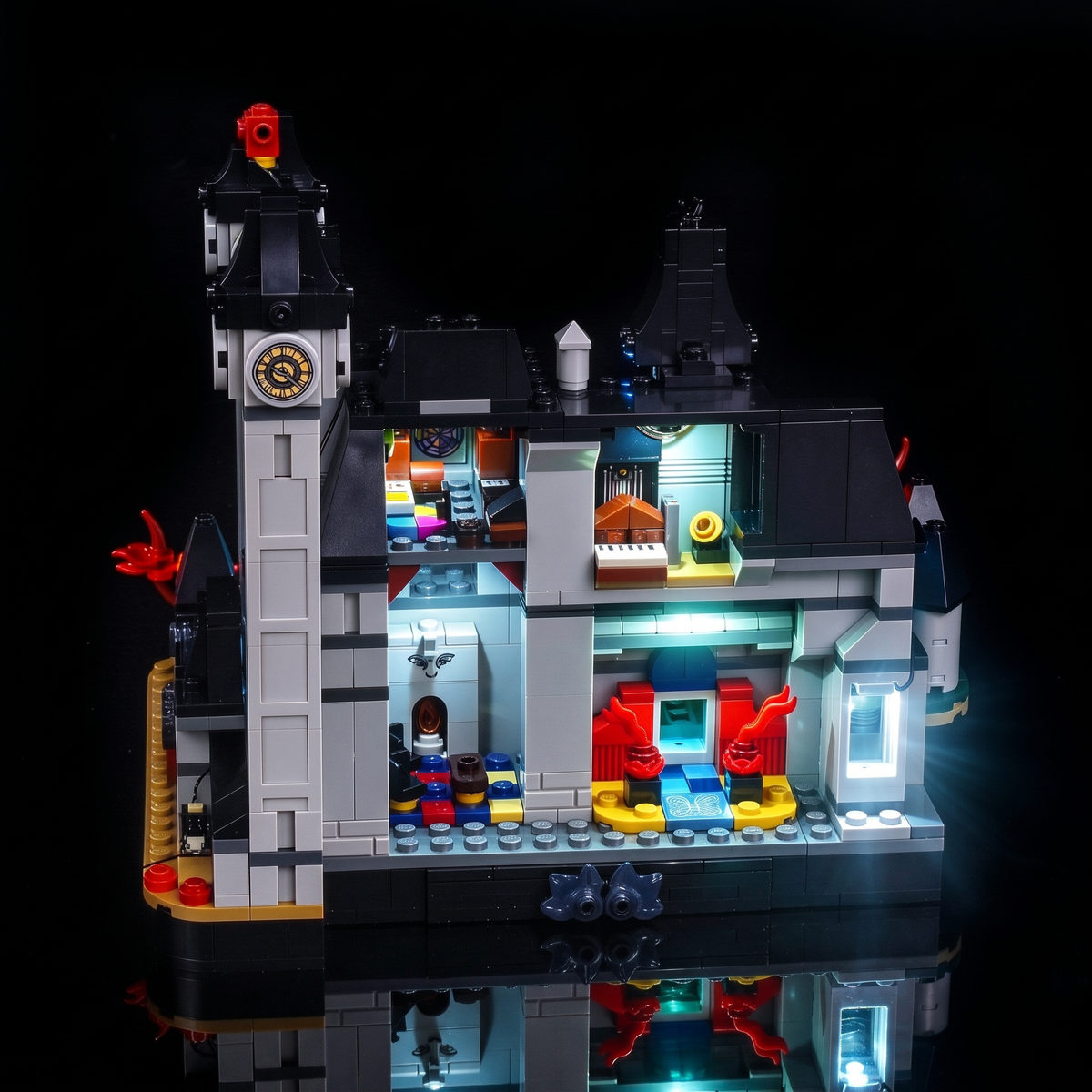 Open rear view showing the white-lit interior rooms and red seats — LEGO® Nevermore Academy #76788, LED light kit