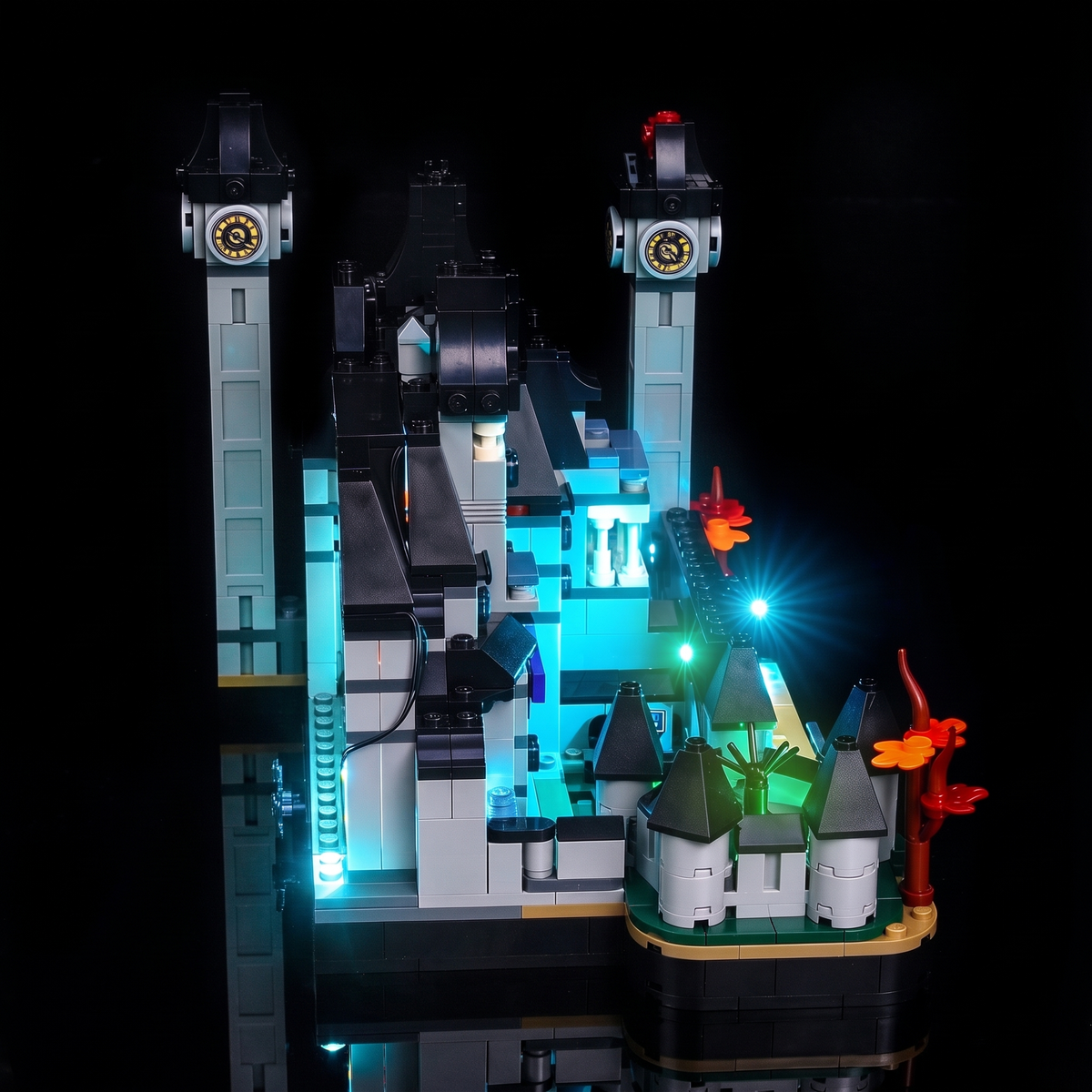 Side view showing a tall clock tower, cyan light and a green point near the base — LEGO® Nevermore Academy #76788, LED light kit
