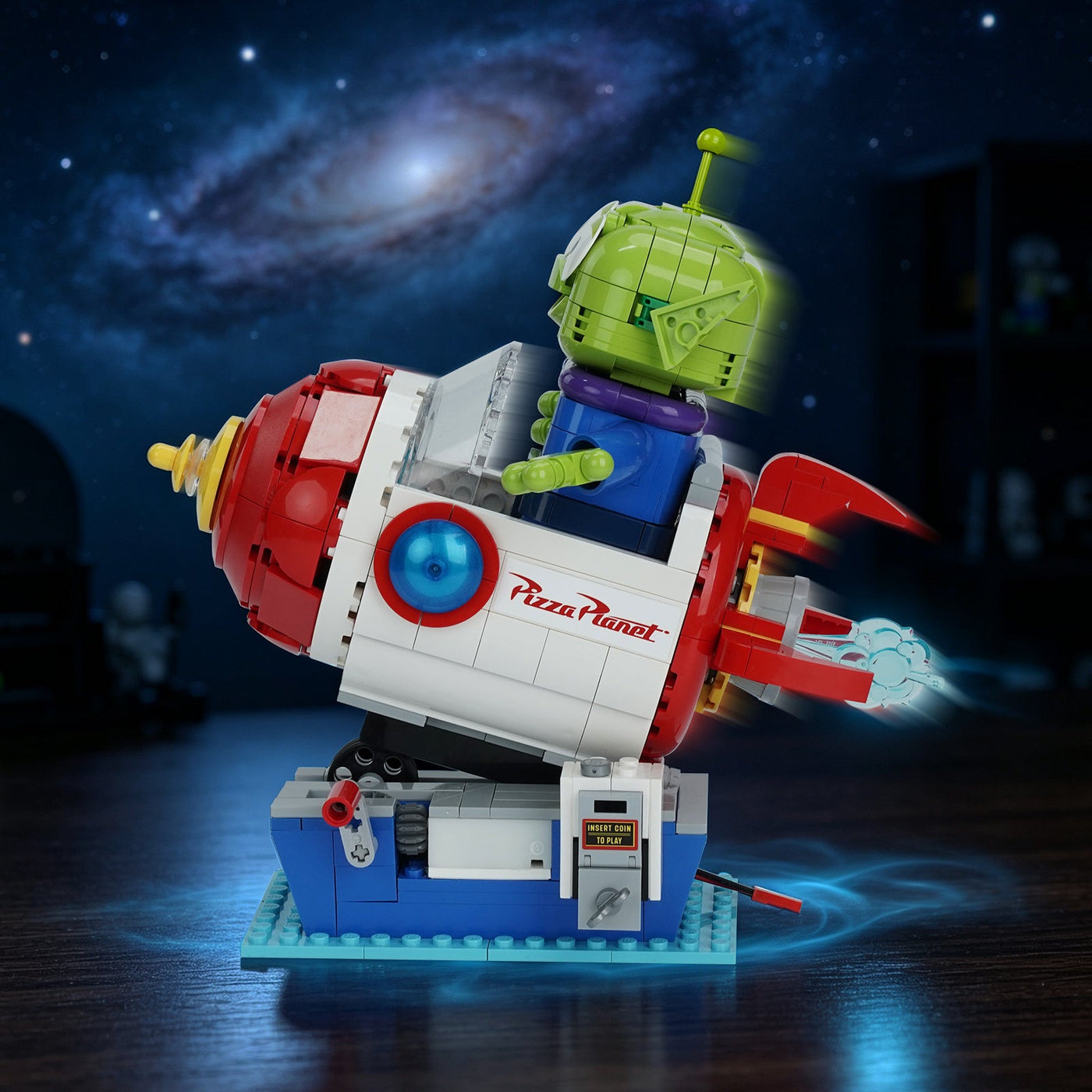 LEGO® Disney Alien with Pizza Planet Rocket Ride #43307 shown from another angle, motorized by Bright My Bricks