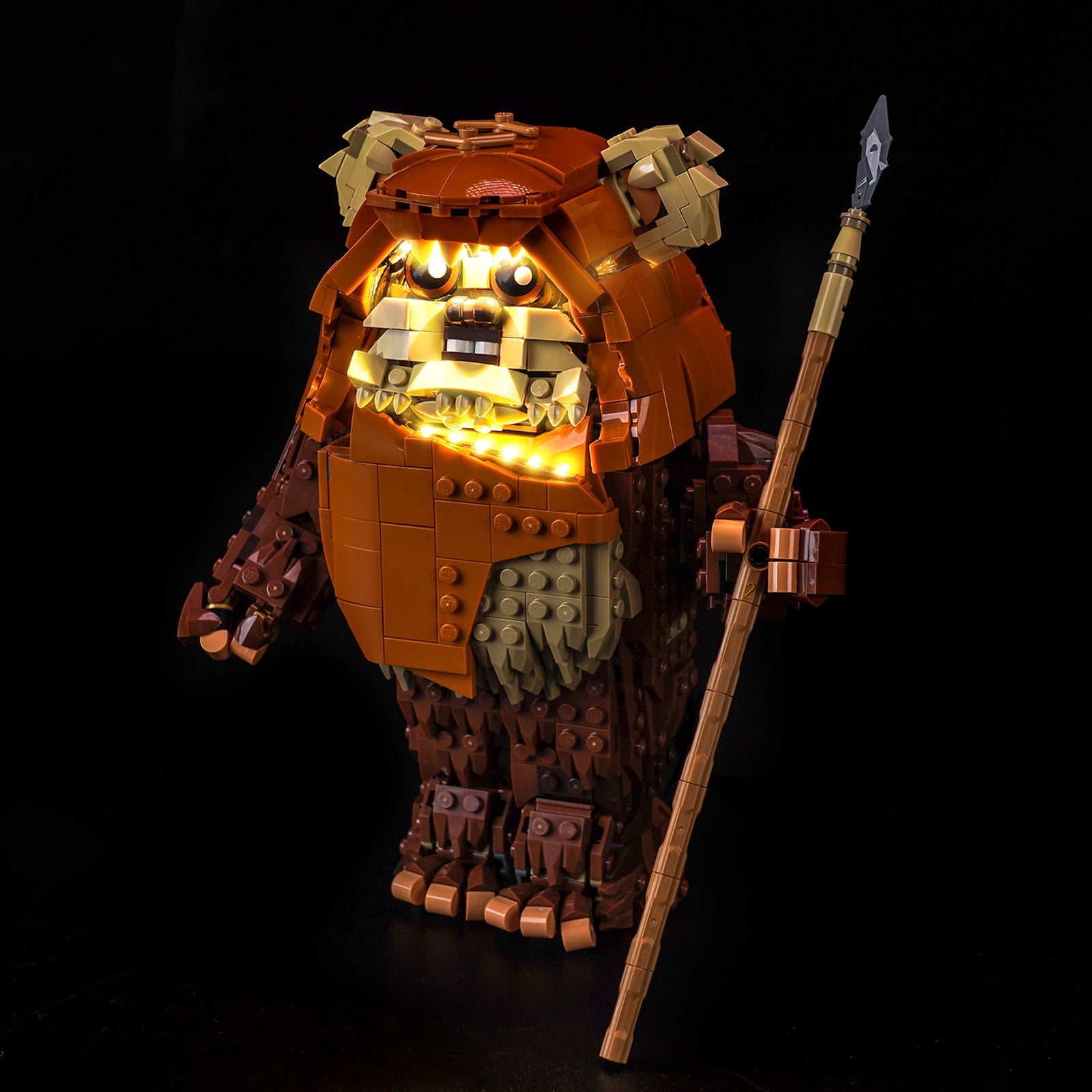 A perfect nighttime display of the lit-up LEGO Wicket the Ewok, creating a realistic Endor forest scene on your shelf.