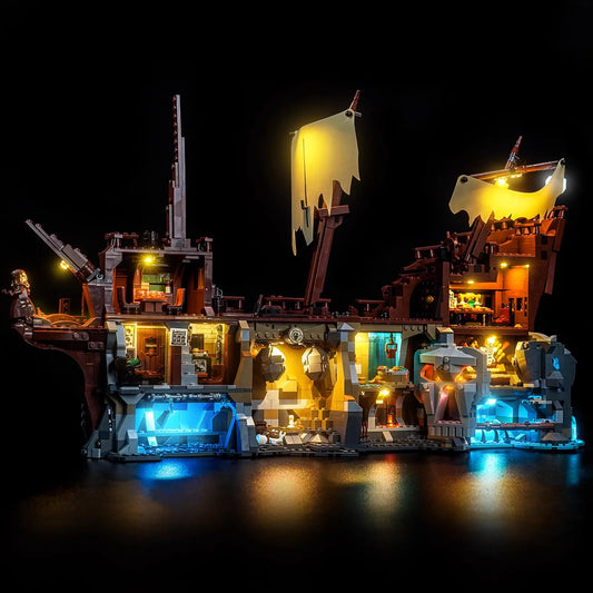 The skeleton of One-Eyed Willy on his throne, dramatically lit by the Bright My Bricks light kit for LEGO 21363.