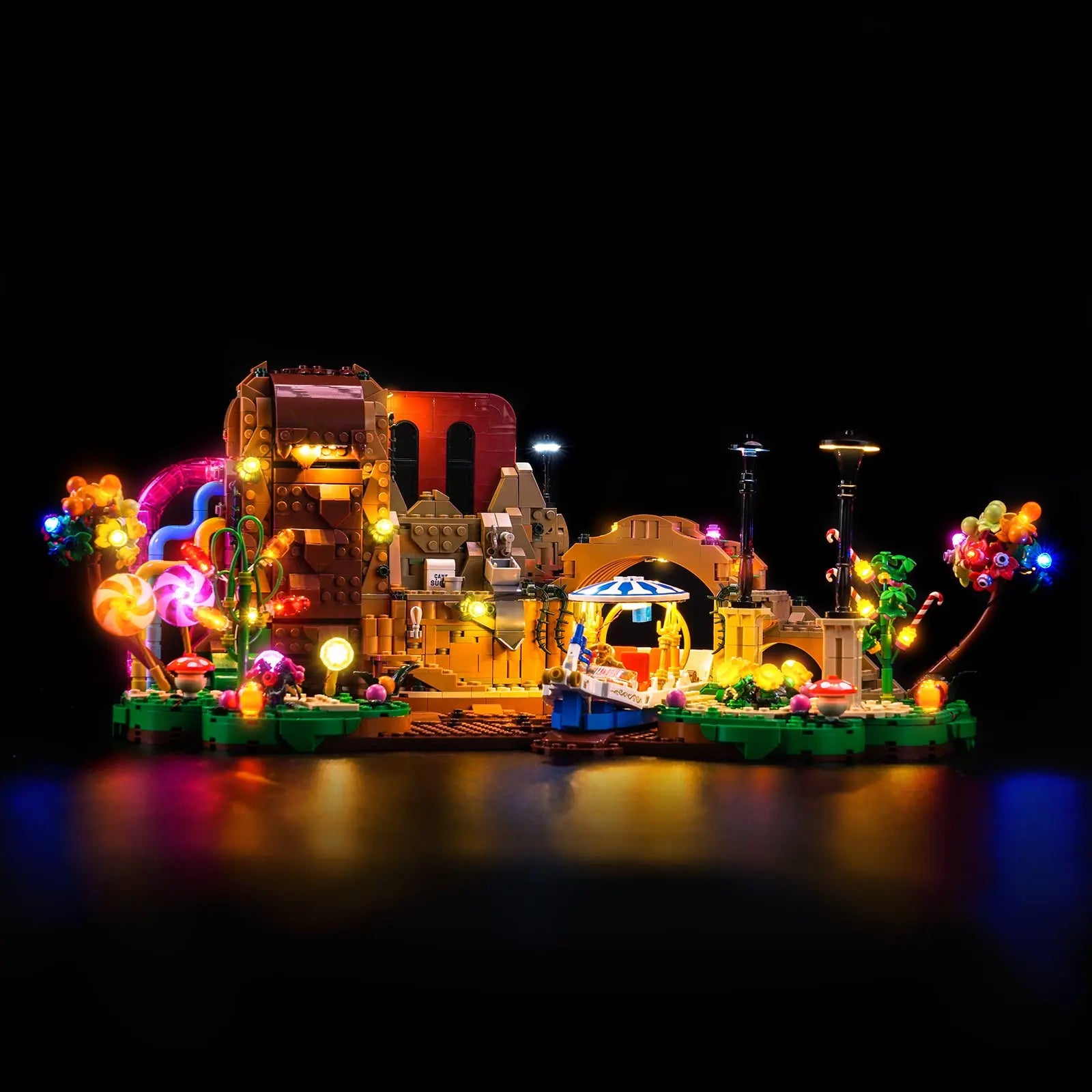 A fun shot of the Oompa-Loompa minifigures working in the brightly lit LEGO Chocolate Factory by Bright My Bricks.