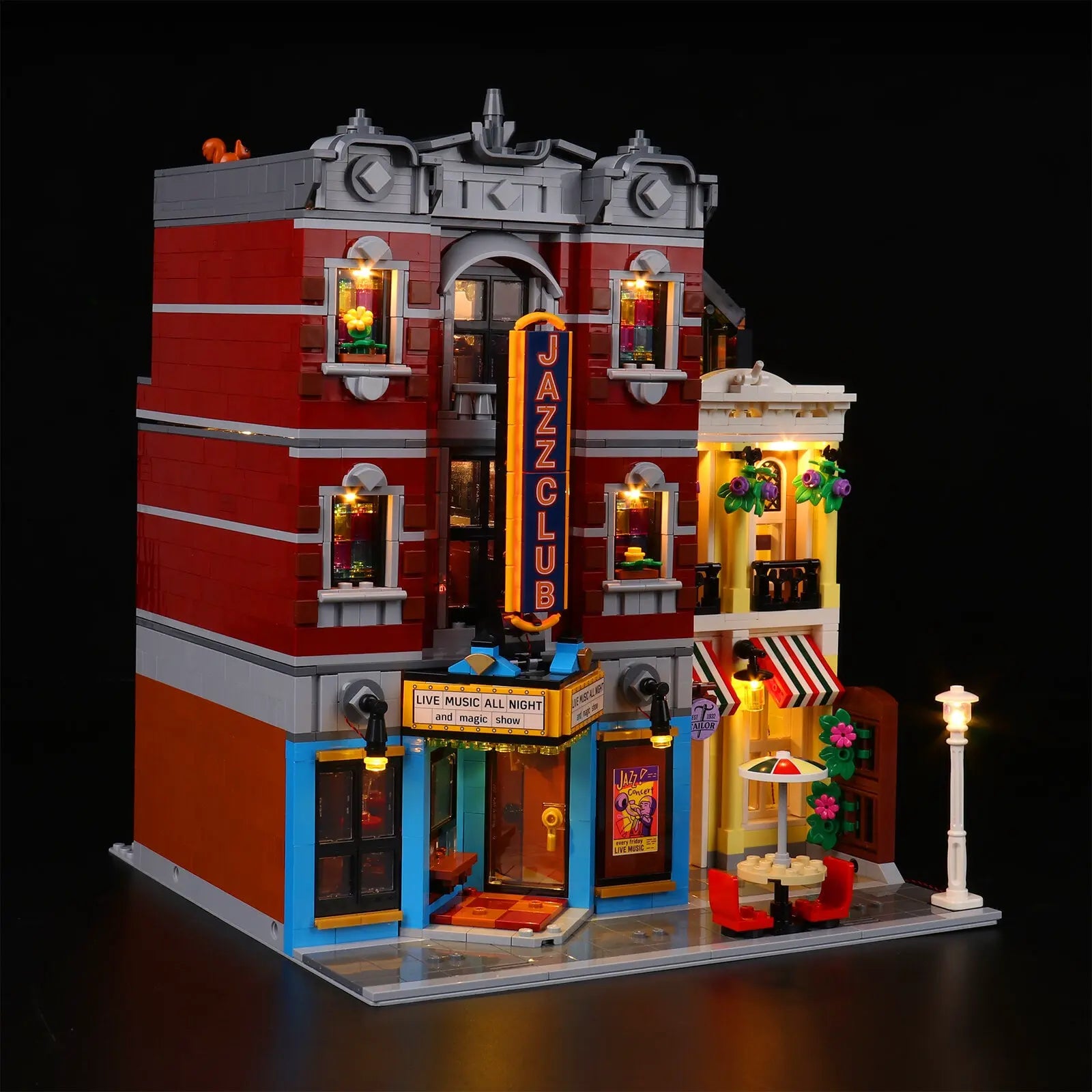 The LEGO Icons Jazz Club 10312 light kit from Bright My Bricks, shown with the included remote for adjusting lighting effects.