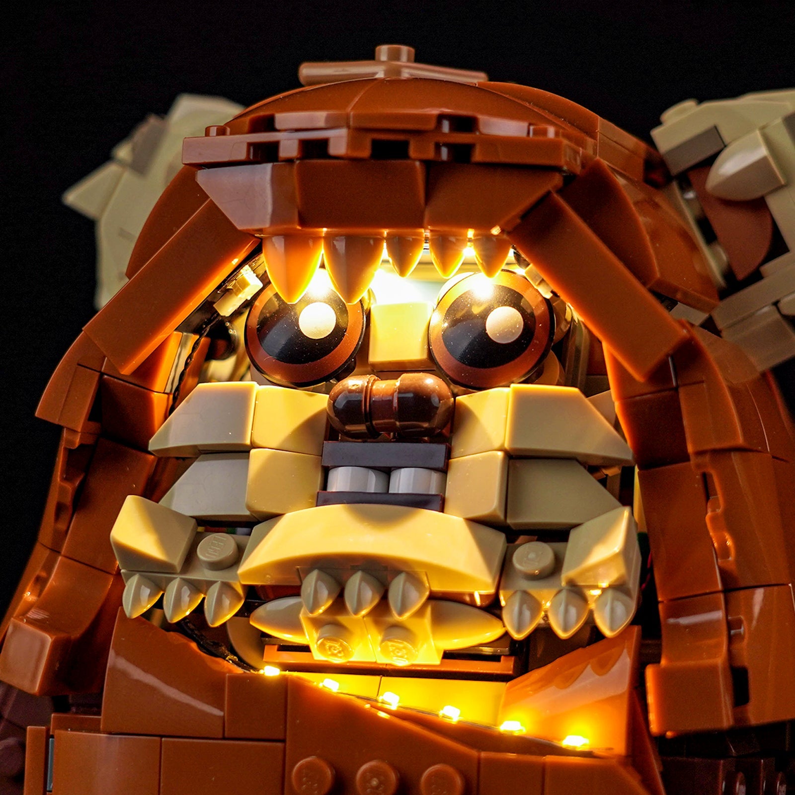 A close-up shot highlighting the subtle lighting details on Wicket's spear and accessories, from the Bright My Bricks kit.