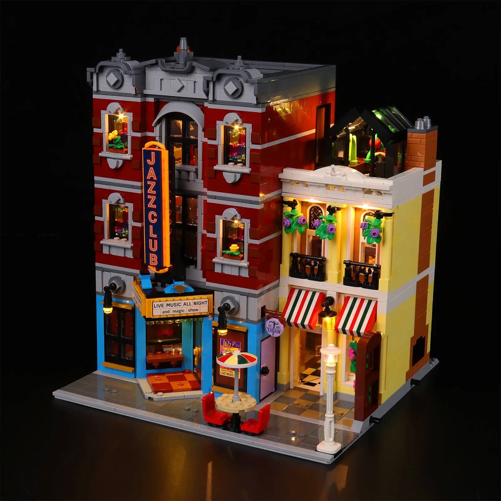 A close-up of the main stage inside the LEGO Jazz Club, with minifigures bathed in atmospheric colored lights from our kit.