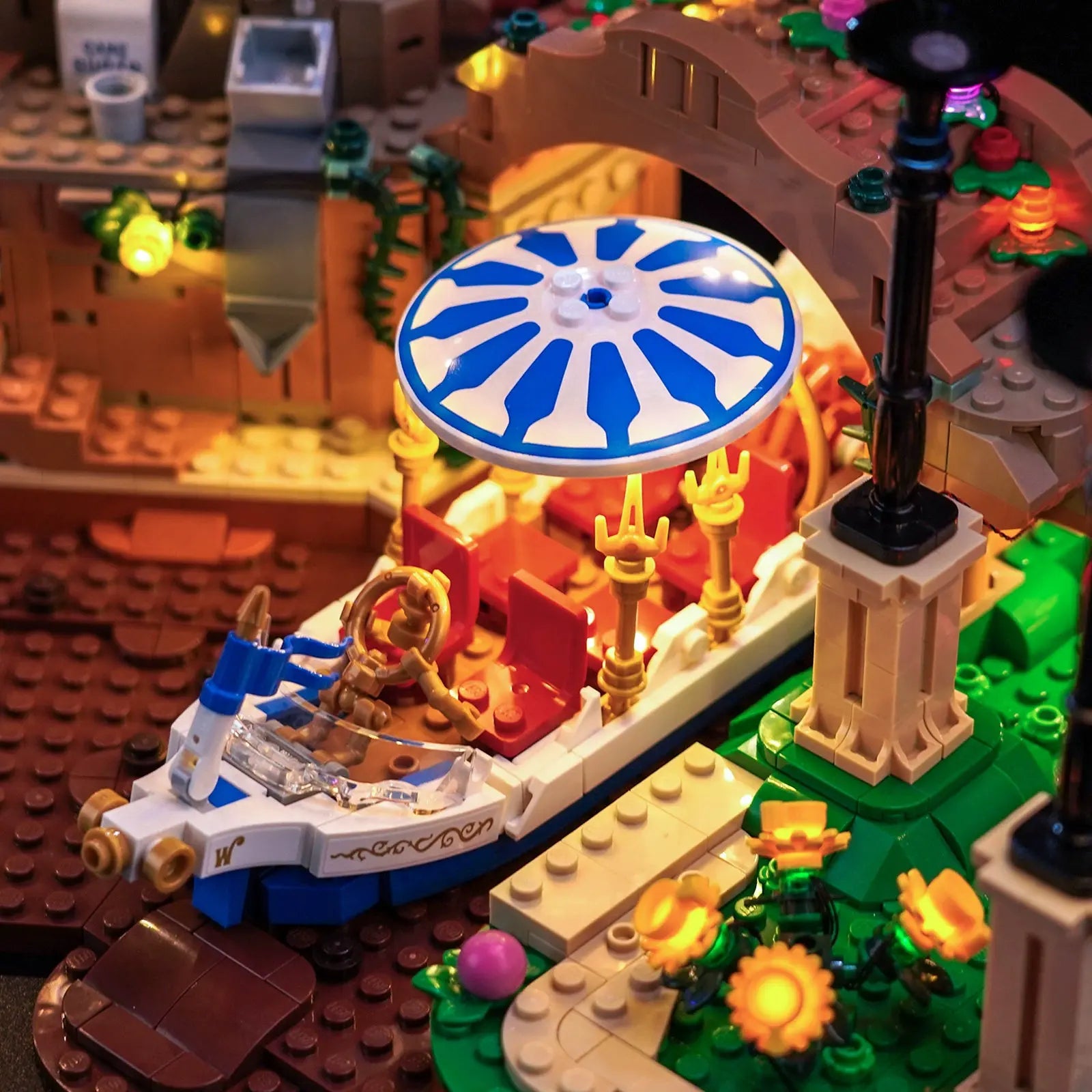 An overhead view of the LEGO Chocolate Factory, showing the beautiful layout of the multi-colored lights across the entire set.