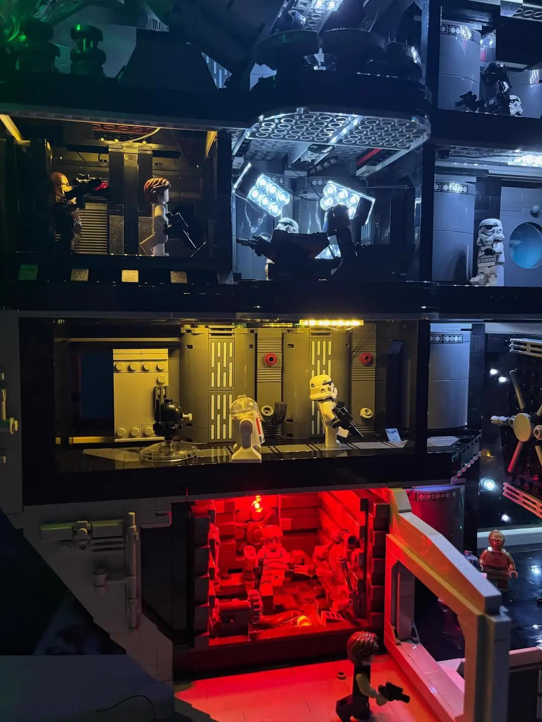 A dynamic angle of the LEGO Death Star 75419, with our light kit highlighting the trench details for a cinematic display.