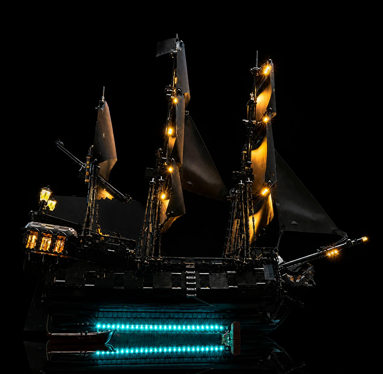 LEGO® Icons Captain Jack Sparrow's Pirate Ship #10365 on its display stand, upgraded LED kit powered on