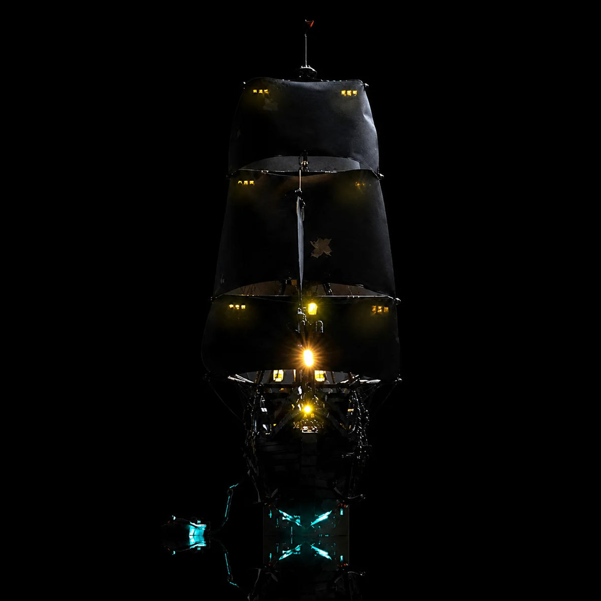 side view of LEGO® Icons Captain Jack Sparrow's Pirate Ship #10365 fully illuminated by the upgraded Bright My Bricks LED kit